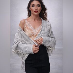 Lucia’s Sarto White and navy fringe sweater jacket with silver rhinestone stars